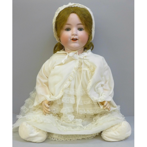 701 - A large antique German Armand Marseille bisque head doll 992A11M, height 22