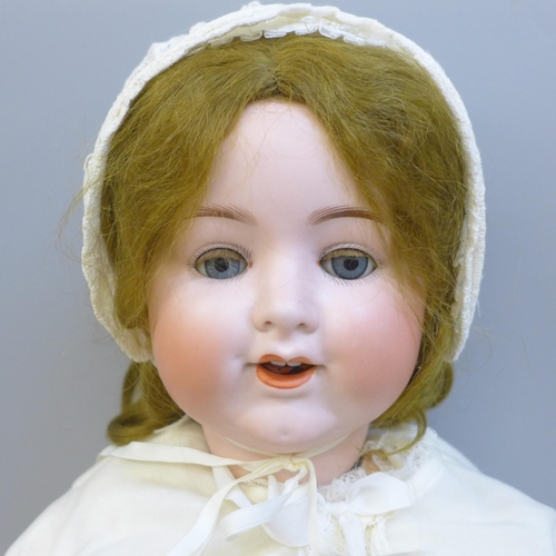 701 - A large antique German Armand Marseille bisque head doll 992A11M, height 22