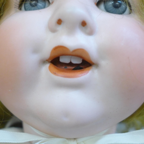 701 - A large antique German Armand Marseille bisque head doll 992A11M, height 22