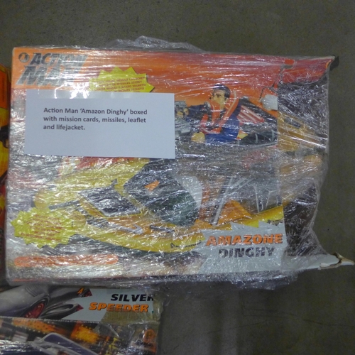 751 - An Action Man Amazon Dinghy, boxed with mission cards, missiles, leaflet and life jacket, an Action ... 