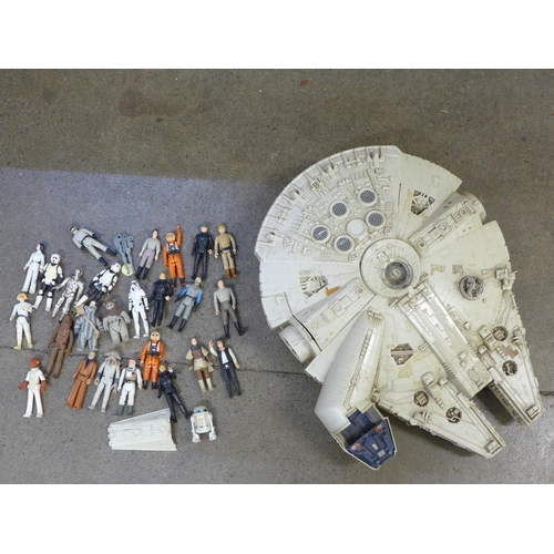 765 - A collection of Star Wars figures and a Millennium Falcon