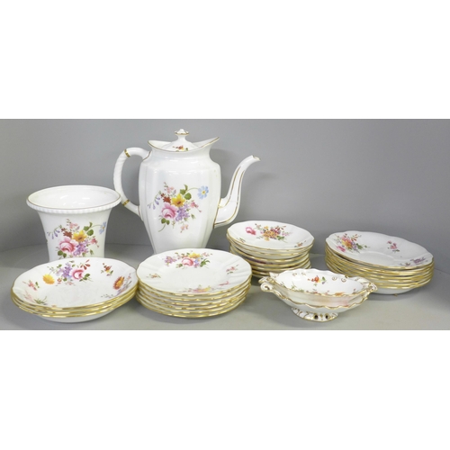 773 - A Royal Crown Derby Derby Posies tea and dinner service, 18 plates, 10 teacups, 9 coffee cups, a pai... 