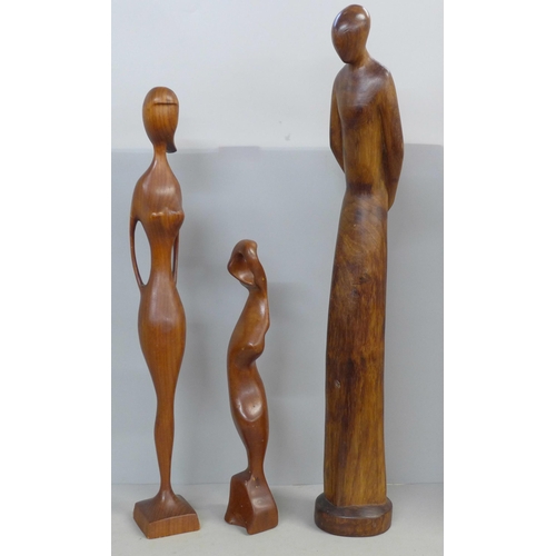 786 - Three carved figures, one a/f, one signed M. Khumalo, 1976