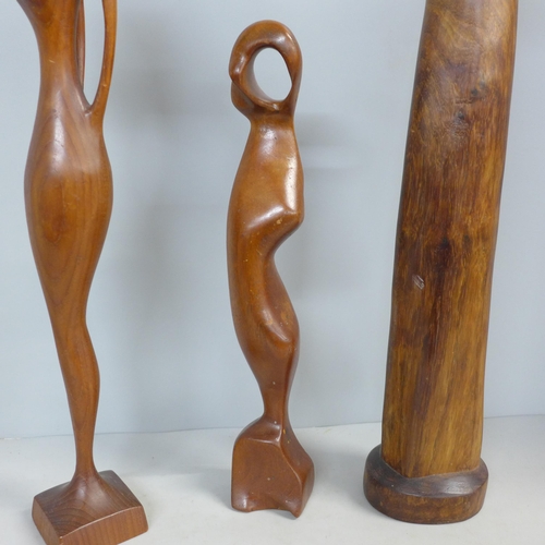 786 - Three carved figures, one a/f, one signed M. Khumalo, 1976