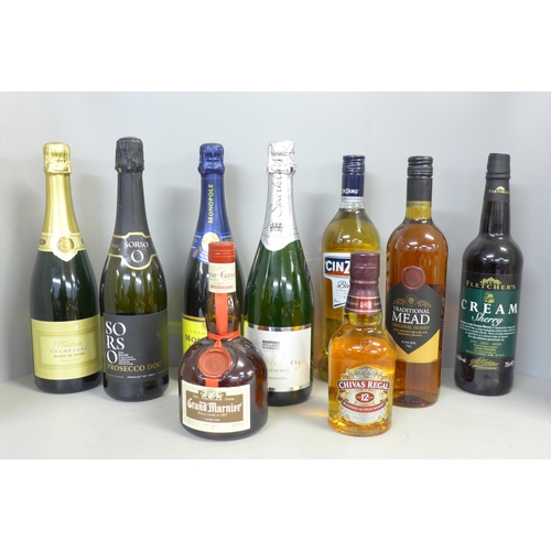 798 - Nine bottles of wines and spirits; Champagne, Chivas Regal, Grand Marnier, Cinzano, etc. **PLEASE NO... 