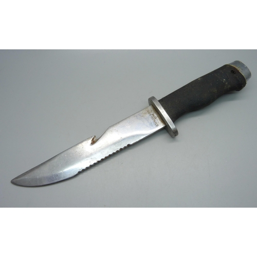 810 - A hunting knife, marked 'stainless steel, Japan', no scabbard