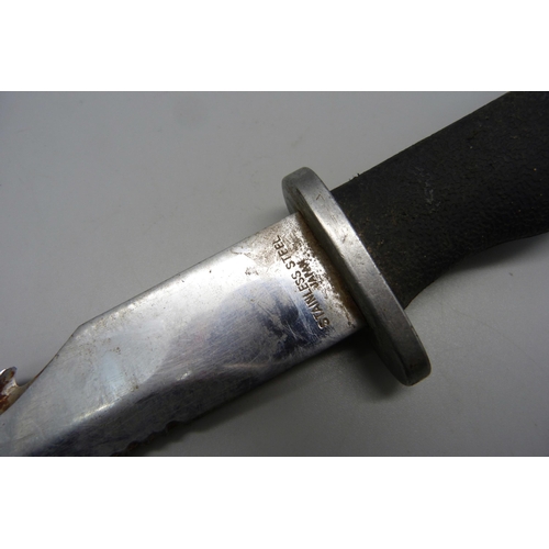 810 - A hunting knife, marked 'stainless steel, Japan', no scabbard