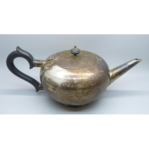 814 - A silver tea pot with inscription, 522g