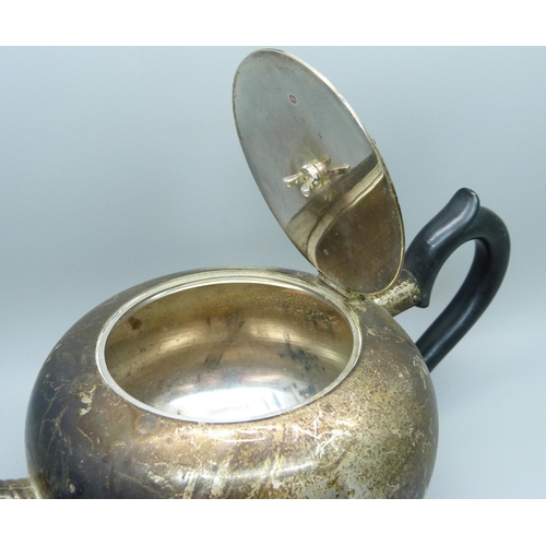 814 - A silver tea pot with inscription, 522g