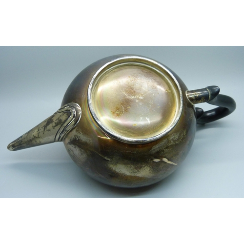 814 - A silver tea pot with inscription, 522g