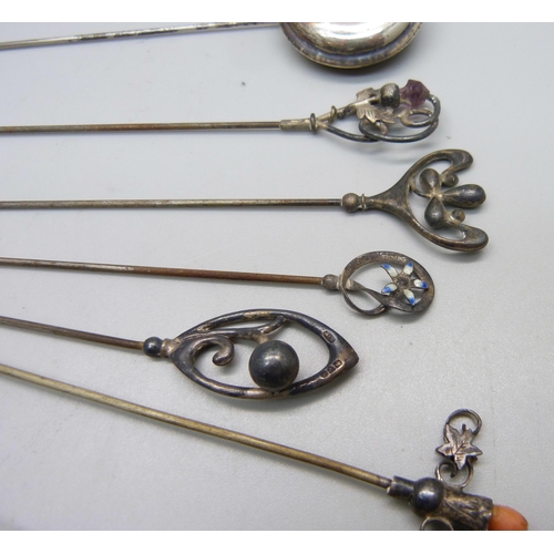 826 - Nine silver hat pins, a plated hat pin and two hat pins decorated with dragonflies