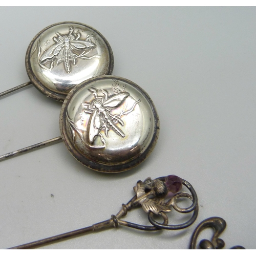 826 - Nine silver hat pins, a plated hat pin and two hat pins decorated with dragonflies