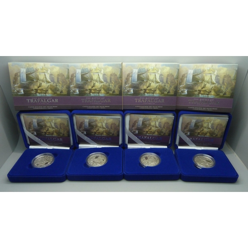 838 - The Royal Mint, four Trafalgar commemorative silver proof crowns, boxed