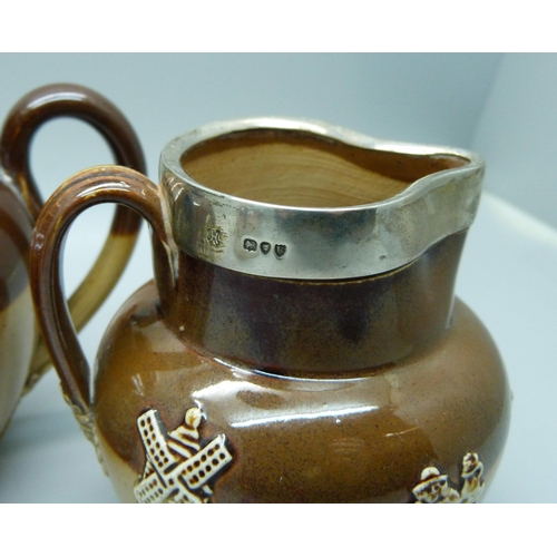 839 - A silver rimmed salt glaze tea service; teapot, sugar and cream