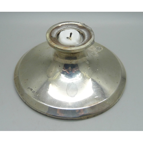 841 - A single silver candlestick, Birmingham 1920s, heavily weighted base, gross weight 256g