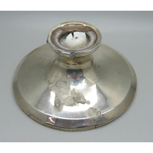 841 - A single silver candlestick, Birmingham 1920s, heavily weighted base, gross weight 256g