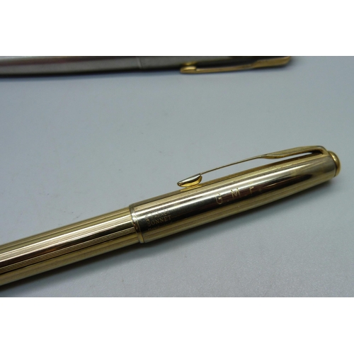 855 - A Parker pen, barrel engraved, a/f and a Parker Sonnet pencil in gold plated casing