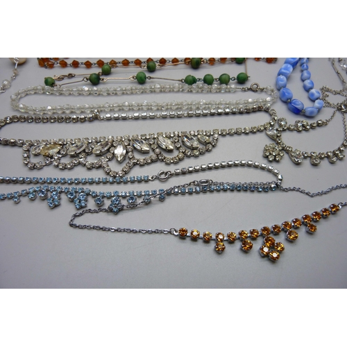 878 - Twelve vintage necklets