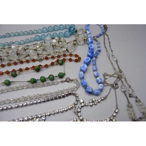 878 - Twelve vintage necklets