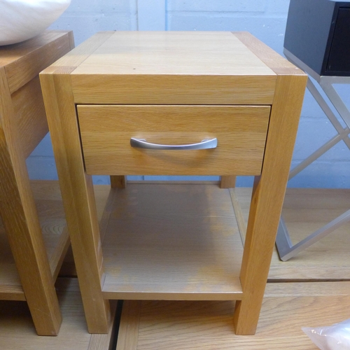 1611 - A pair of oak bedside tables * this lot is subject to VAT