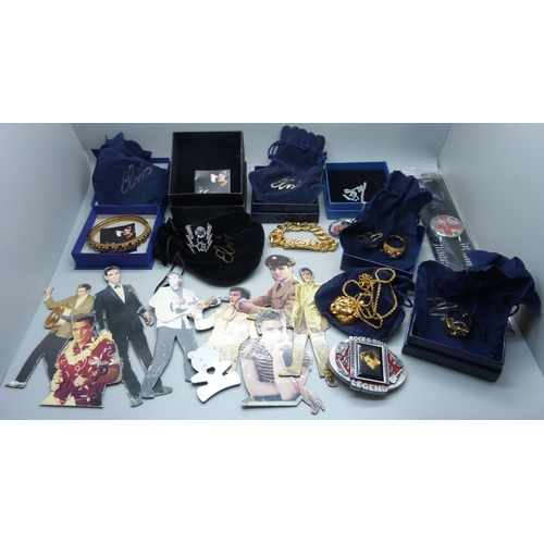 896 - Elvis Presley memorabilia; boxed jewellery, wristwatch, belt buckle and fridge magnets