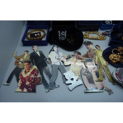 896 - Elvis Presley memorabilia; boxed jewellery, wristwatch, belt buckle and fridge magnets