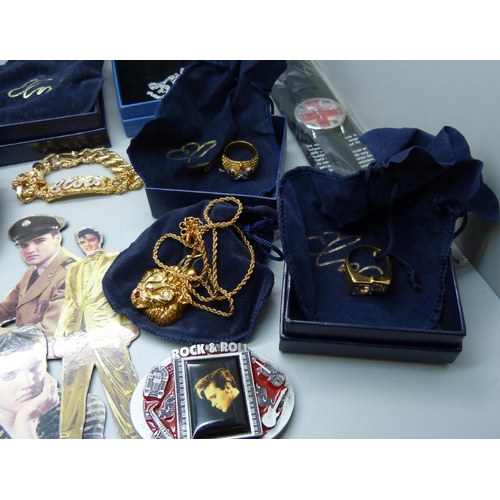 896 - Elvis Presley memorabilia; boxed jewellery, wristwatch, belt buckle and fridge magnets