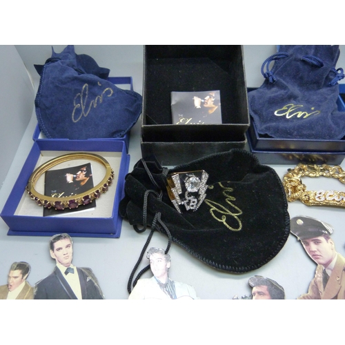 896 - Elvis Presley memorabilia; boxed jewellery, wristwatch, belt buckle and fridge magnets