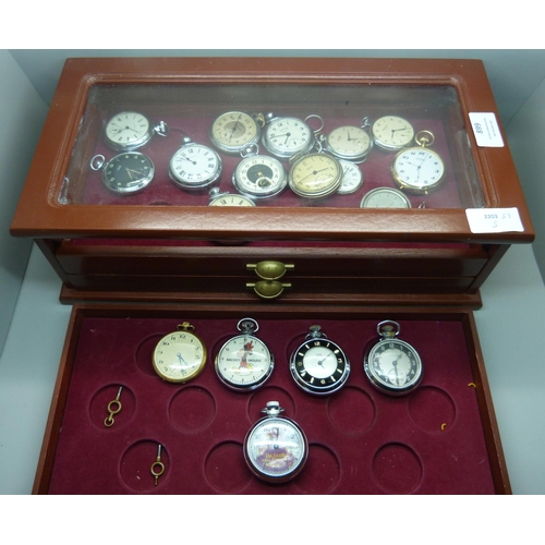 899 - A three-drawer cabinet containing thirty 'dollar' and other pocket watches, including Disney Mickey ... 