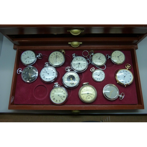 899 - A three-drawer cabinet containing thirty 'dollar' and other pocket watches, including Disney Mickey ... 