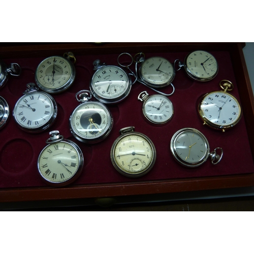 899 - A three-drawer cabinet containing thirty 'dollar' and other pocket watches, including Disney Mickey ... 