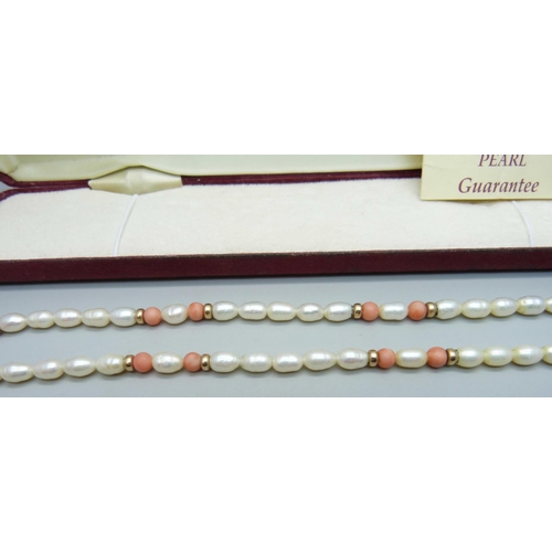 904 - A Jersey Pearl necklace with 9ct gold clasp, boxed