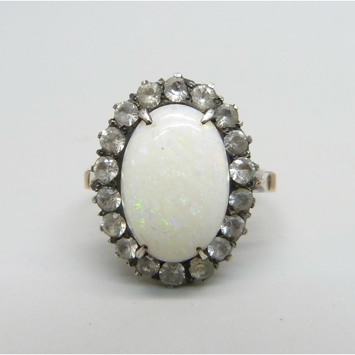 907 - A 9ct gold, opal and white stone ring, 3.5g, L