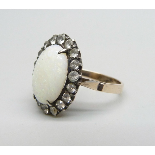 907 - A 9ct gold, opal and white stone ring, 3.5g, L