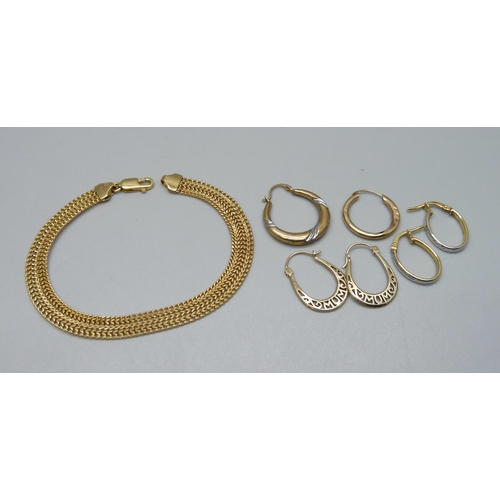 909 - A 9ct gold bracelet, a pair of 9ct gold earrings, a single 9ct gold earring and three yellow metal e... 