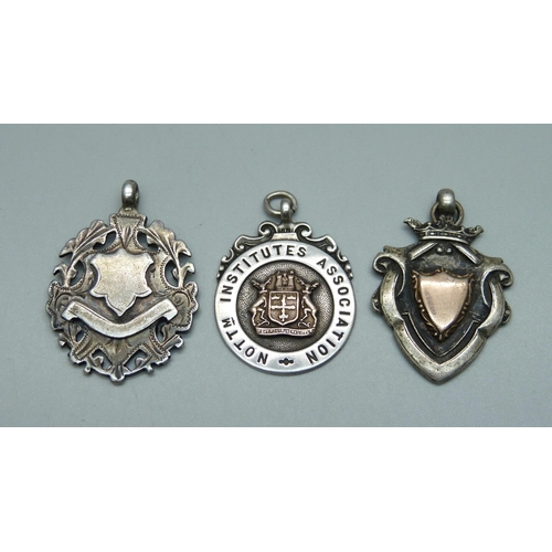 912 - Three silver fob medals, 28g