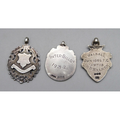 912 - Three silver fob medals, 28g