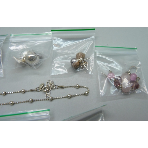 914 - Ten pairs of silver earrings and two 925 silver bracelets