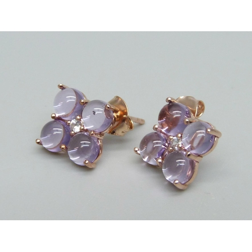 919 - A pair of silver gilt, pink cabochon stone and zircon earrings