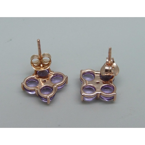 919 - A pair of silver gilt, pink cabochon stone and zircon earrings