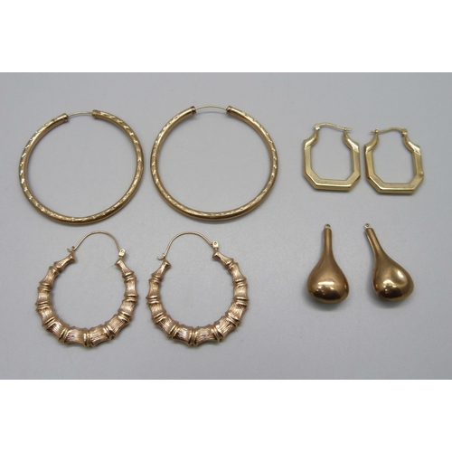 923 - Three pairs of 9ct gold earrings and a pair of yellow metal earring lacking loops, 11.4g