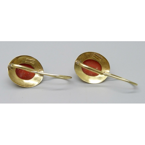 937 - A pair of 18ct gold, faceted coral earrings, 4.1g