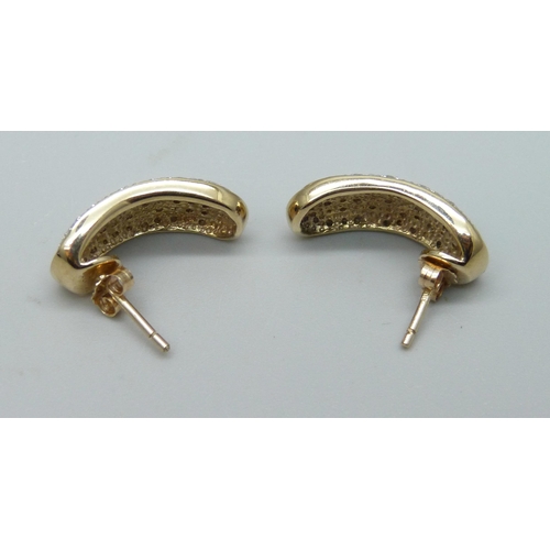 938 - A pair of 9ct gold and diamond set cuff style earrings with butterflies, approximately 0.50ct diamon... 