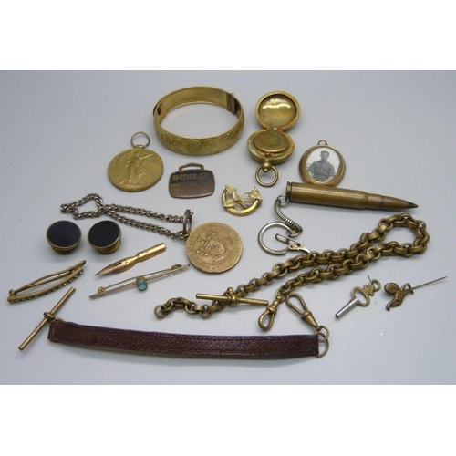 955 - A plated bangle, Victorian brass chain, sovereign case and other jewellery