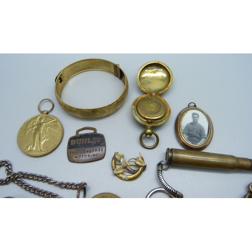 955 - A plated bangle, Victorian brass chain, sovereign case and other jewellery