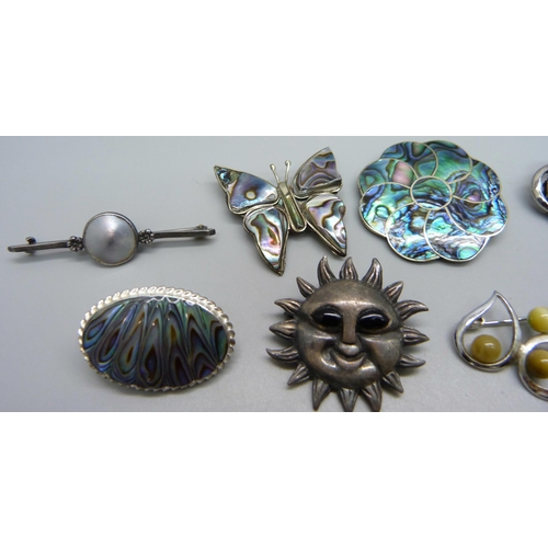 956 - Silver and abalone brooches and other silver brooches