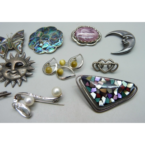 956 - Silver and abalone brooches and other silver brooches