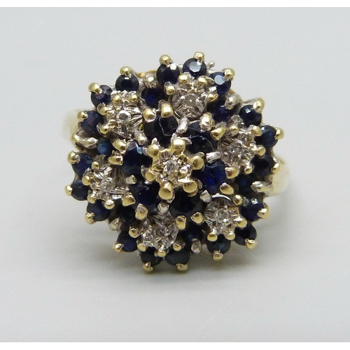 962 - An 18ct gold, sapphire and diamond cocktail cluster ring, 6g, T