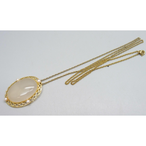 963 - A silver gilt, white agate and freshwater pearl pendant on a plated chain, with certificate