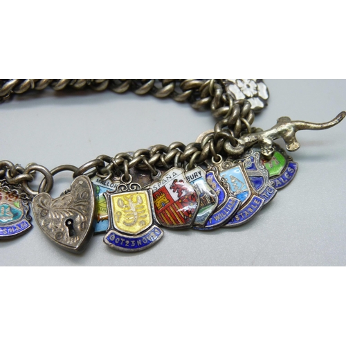 964 - A silver charm bracelet, 75g